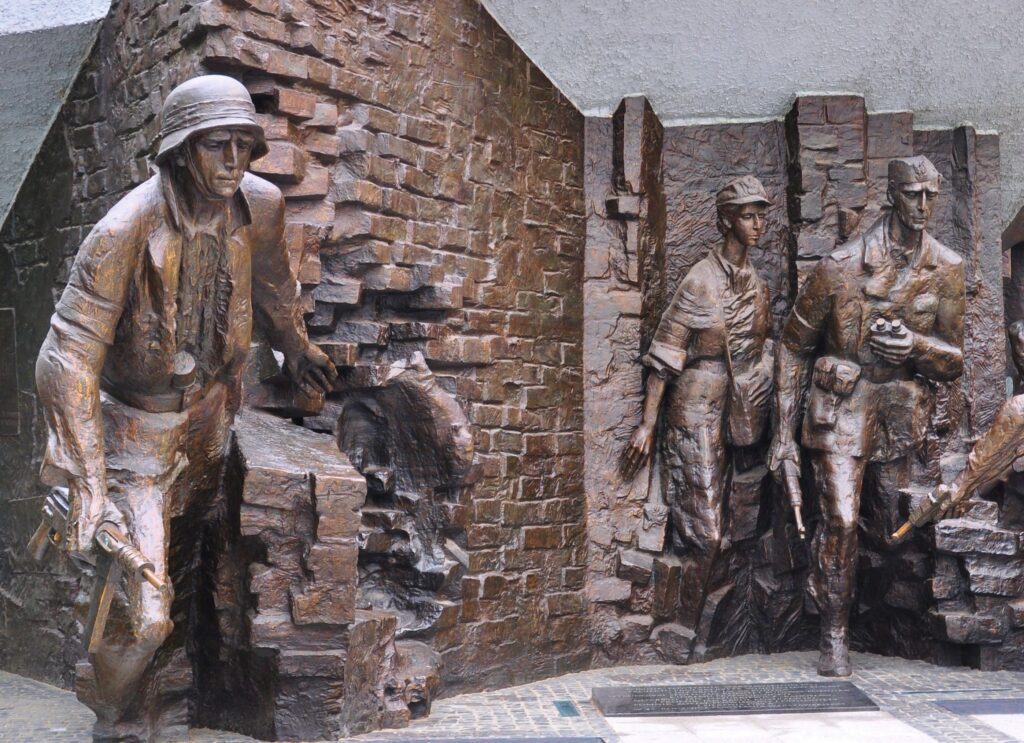 The image shows a monument from Warsaw's Rising Museum